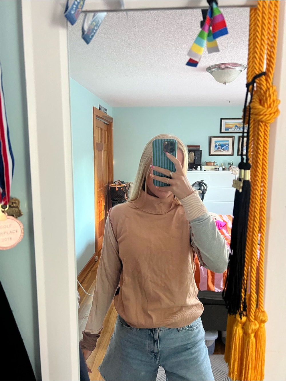 Neutral color block turtleneck sweater with contrast stitching
